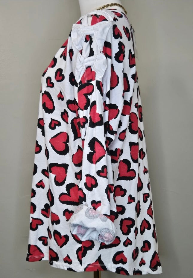 Style 1008 heart print long sleeve with bow details on shoulder slit
