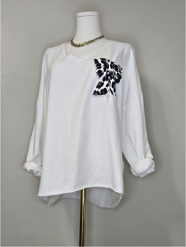 Style 1074 White v-nk with animal print applique'